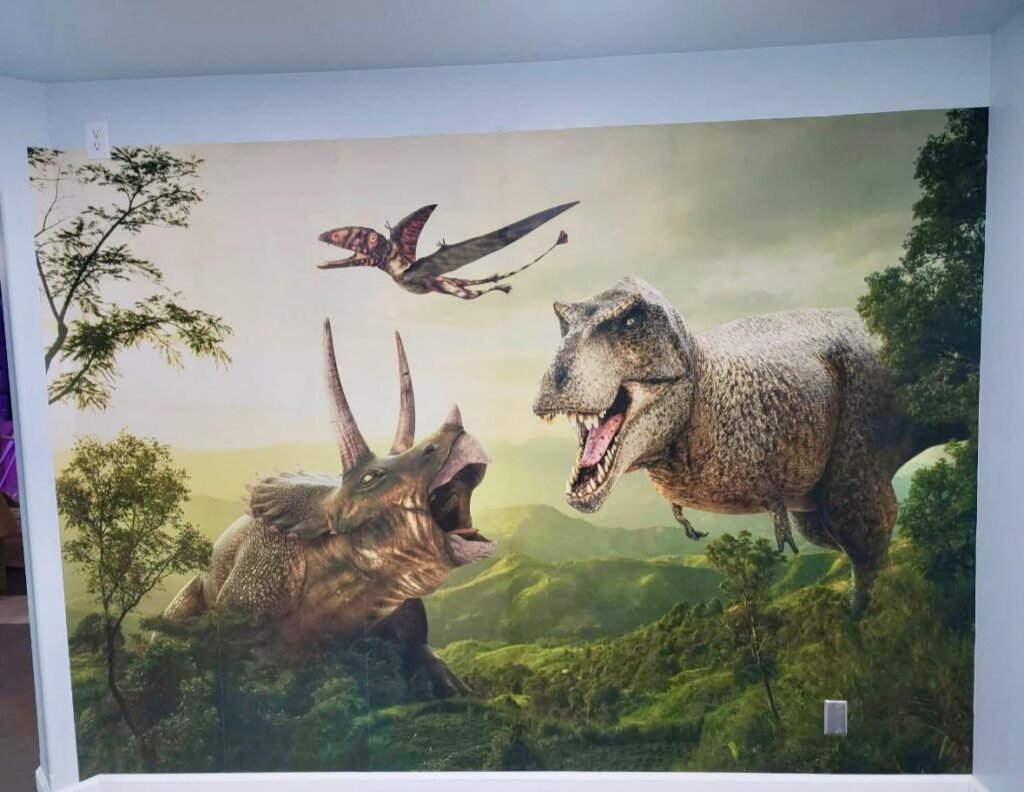 Custom painted dinosaur wallpaper mural for a local kids playroom