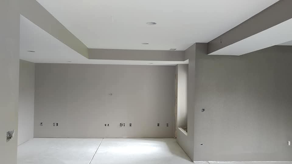 Drywalls get installed in a home in Southern Wisconsin area